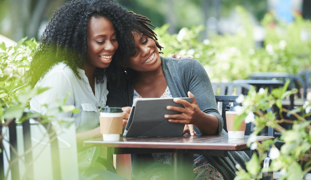 Two black women enjoying coffee together